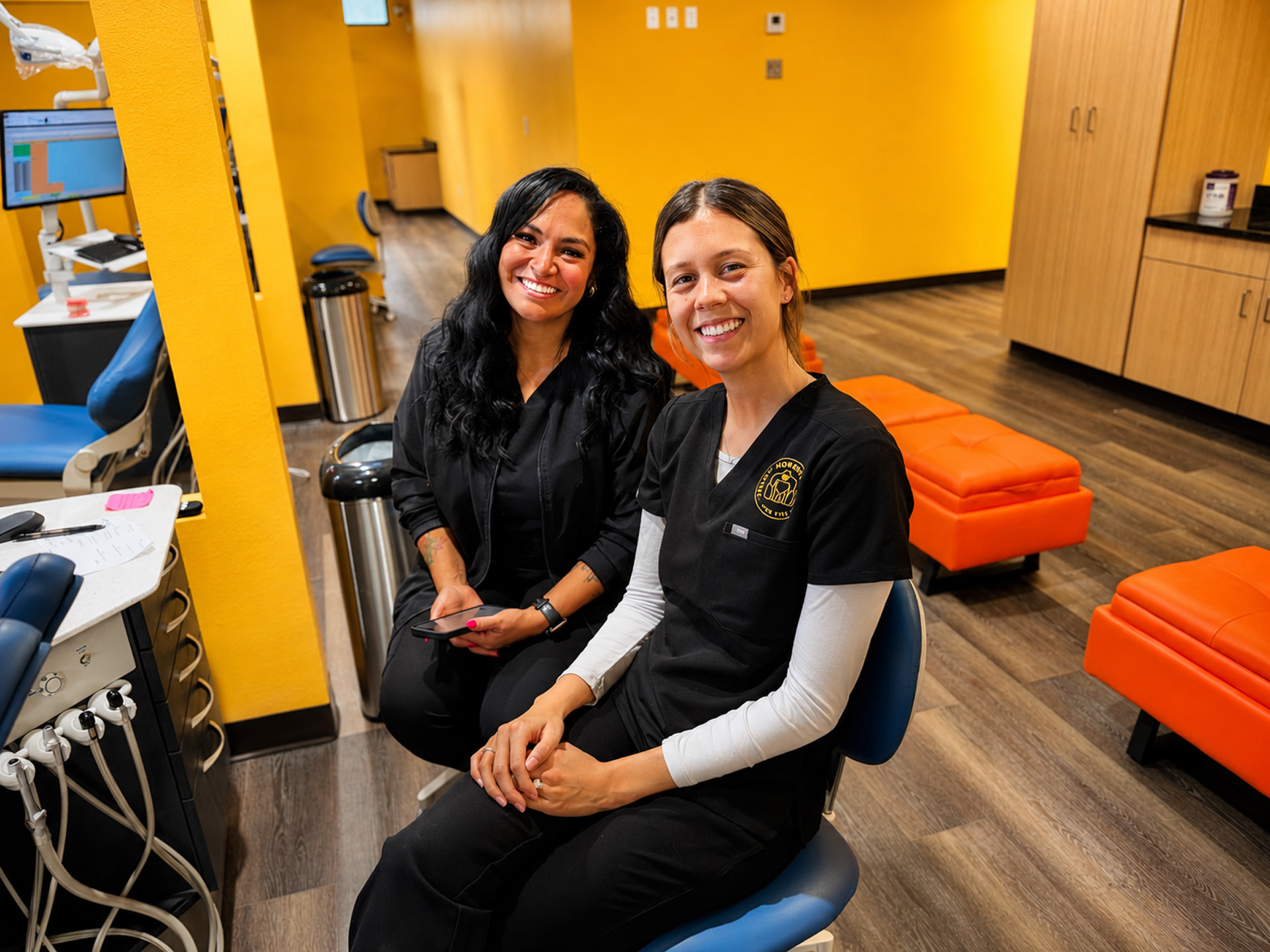 Two Female Dental Staff Members Smiling